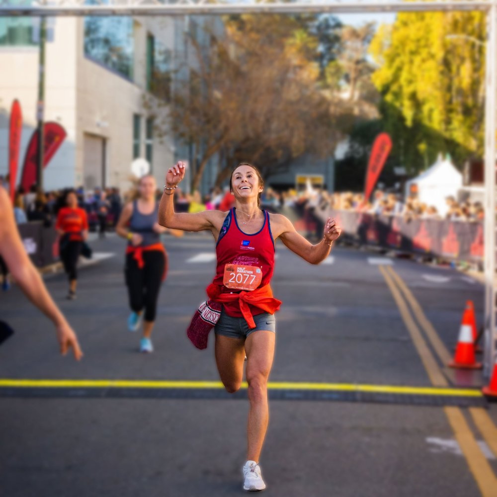 Runner finishing race at ACS DeteriNation event